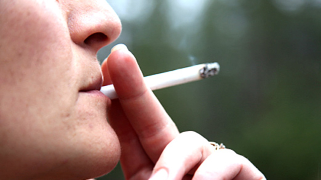 person smoking cigarette Making Your Last Smoke Count